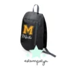 Mochila comunión nombre e inicial colores amarilla