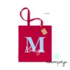 Bolsa con nombre e inicial para invitados - Estampatya Bolsa con nombre e inicial para eventos roja
